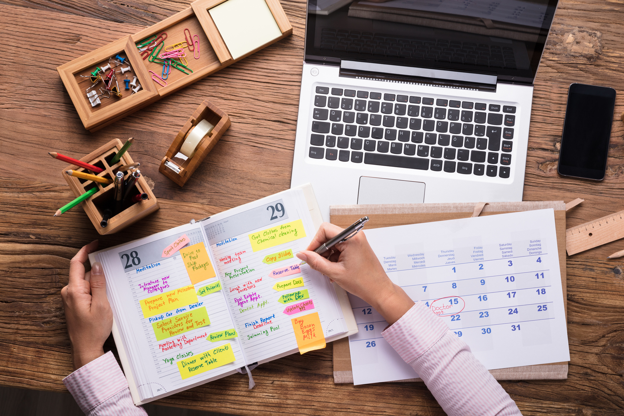 Hand Writing on an Organizer 