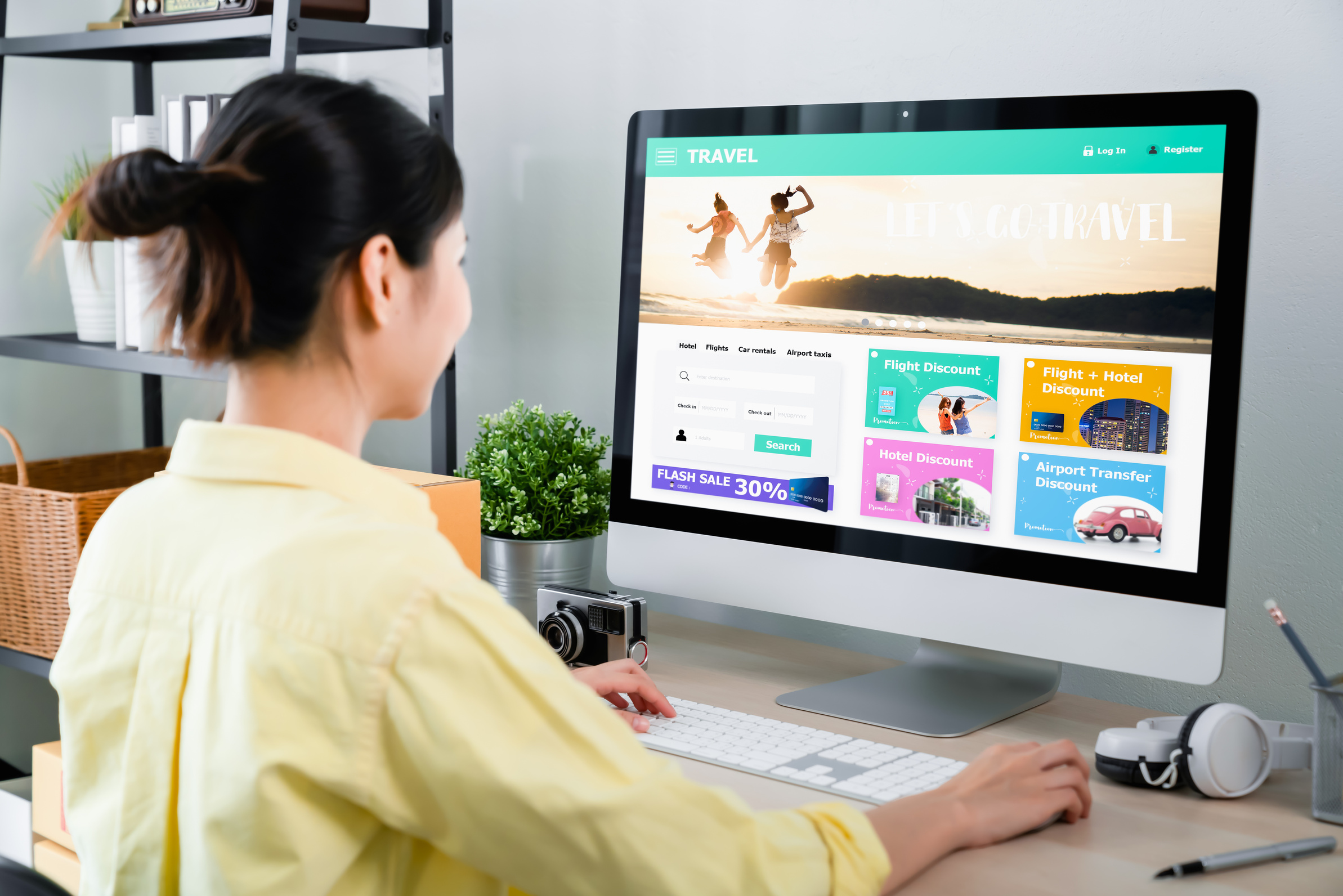 Woman Looking at a Travel Website on a Computer