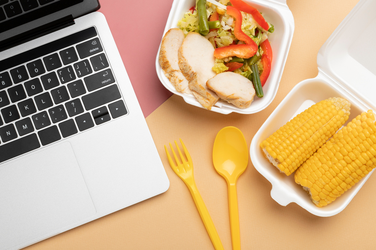 top-view-food-laptop-arrangement